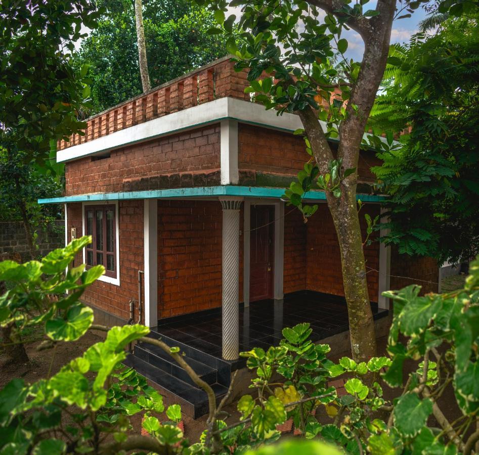 Hotel Secret Paradise à Varkala Extérieur photo